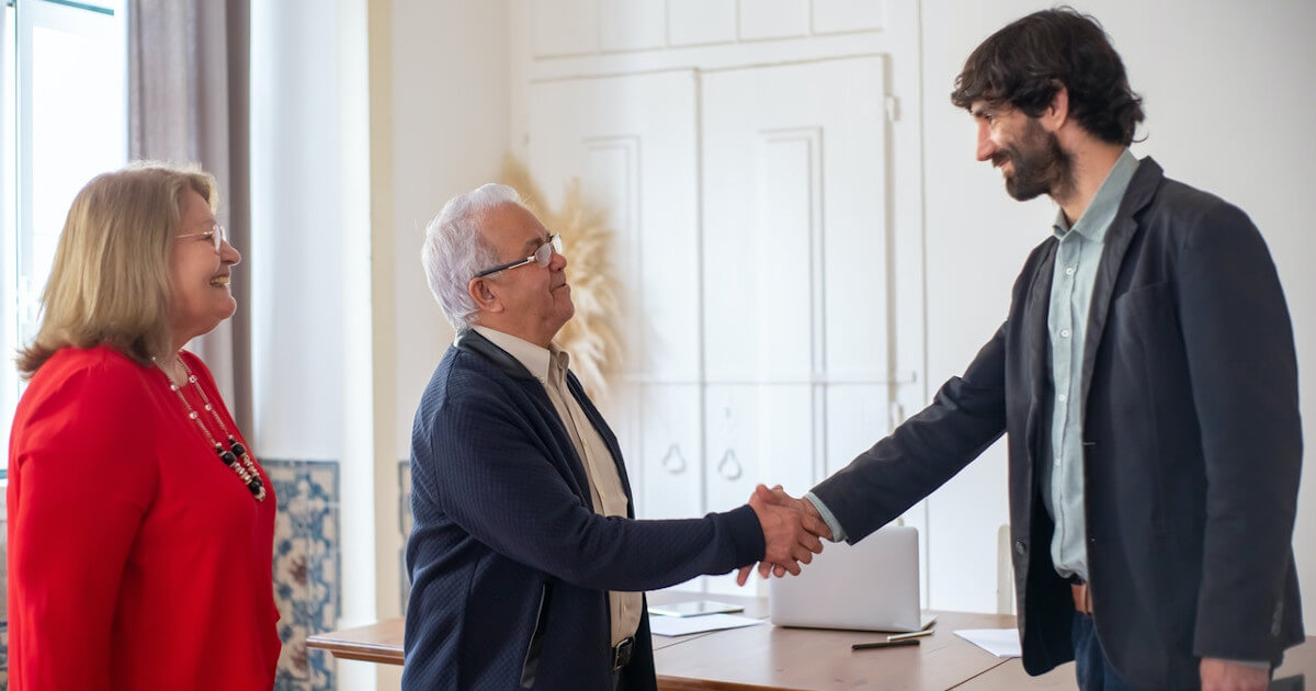 how many touchpoints is enough - photo of meeting new clients by pexels-kampus-production